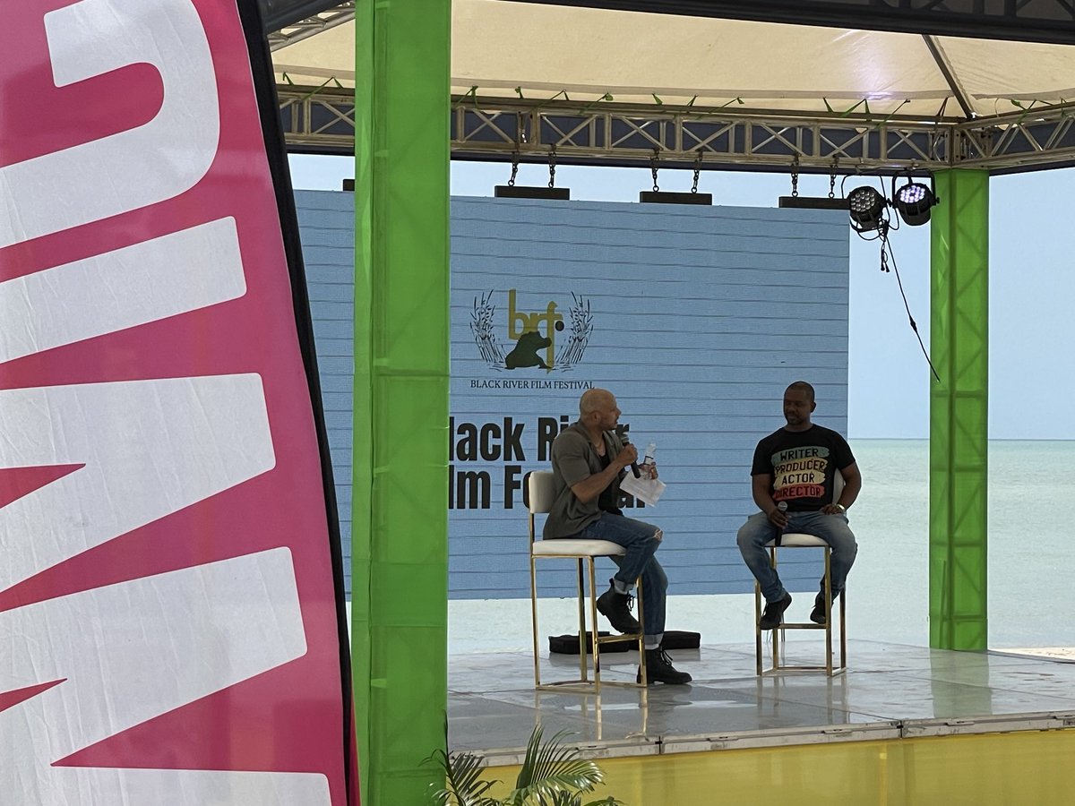 JustineHenzell's tweet photo. Marcos James sharing his Game of Thrones experience with Kevin Jackson. Marcos role was White Rat #GOT @VisitJamaicaNow #BRFF @jaftaonline #film 🇯🇲 https://t.co/aOEZHStnGQ