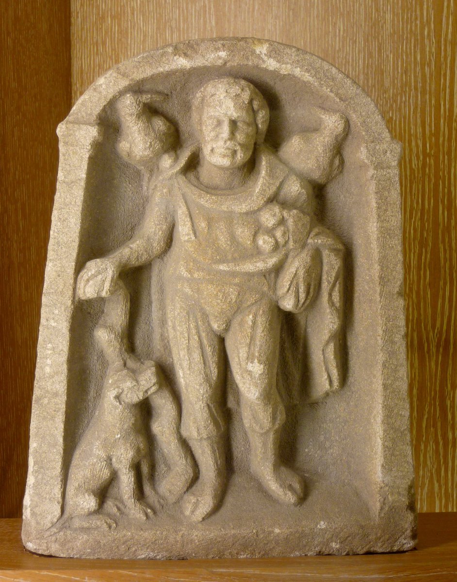 Sagnamadr's tweet photo. This very Odin-like Gallo-Roman statue was found in Moux, southern France, and is believed to depict Lugh with his ravens/crows and his dog Failinis. https://t.co/UPXT6kYNWZ