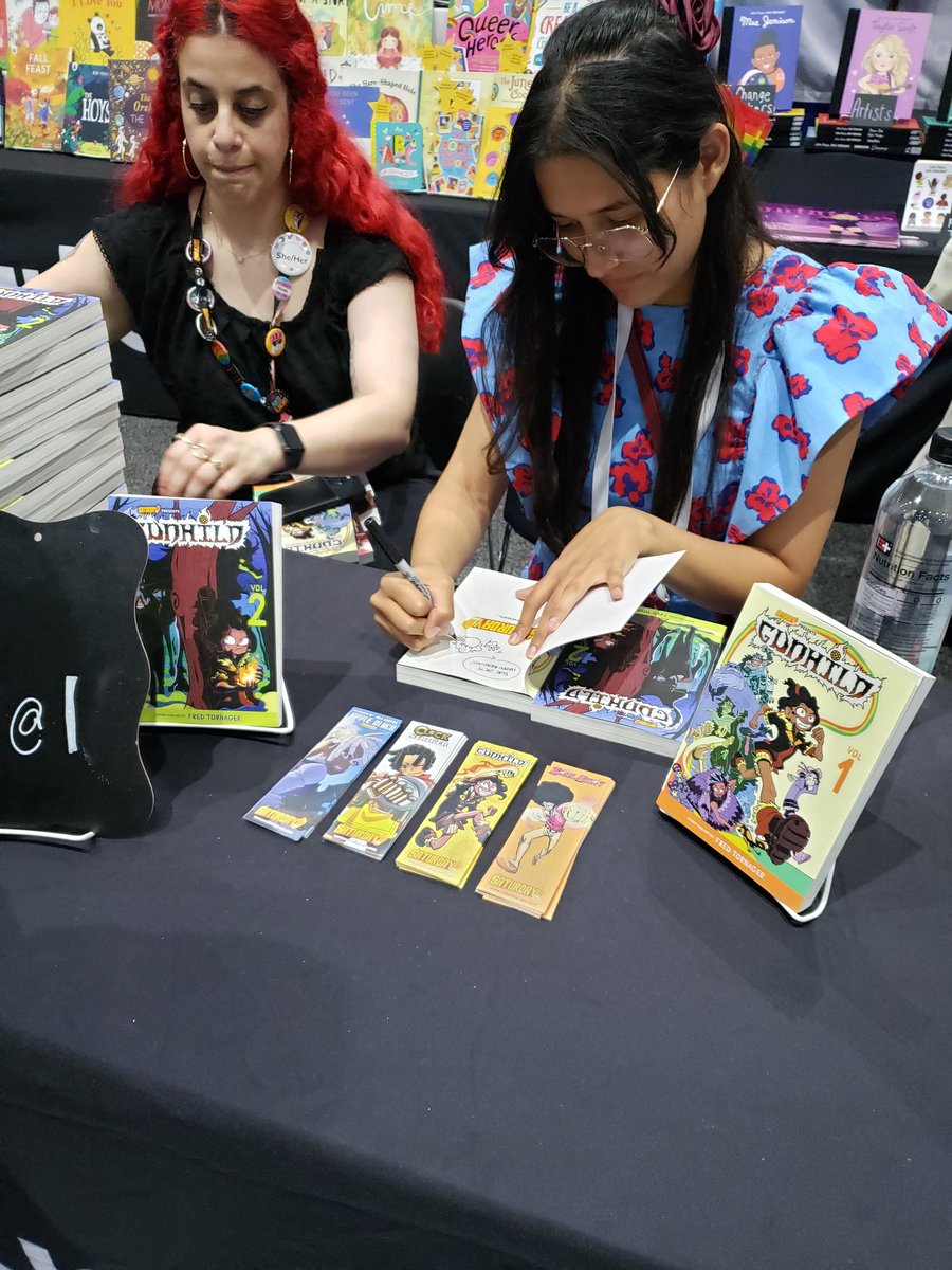 SoulBeatManga's tweet photo. The line is growing and the signatures/books are flying off the table! Come get your copies of #Gunhild while supplies last and get them signed by the creator @fred_tornager! Were at @QuartoKids booth 535 from 1pm to 2pm today! https://t.co/ZJOdjnEHhR