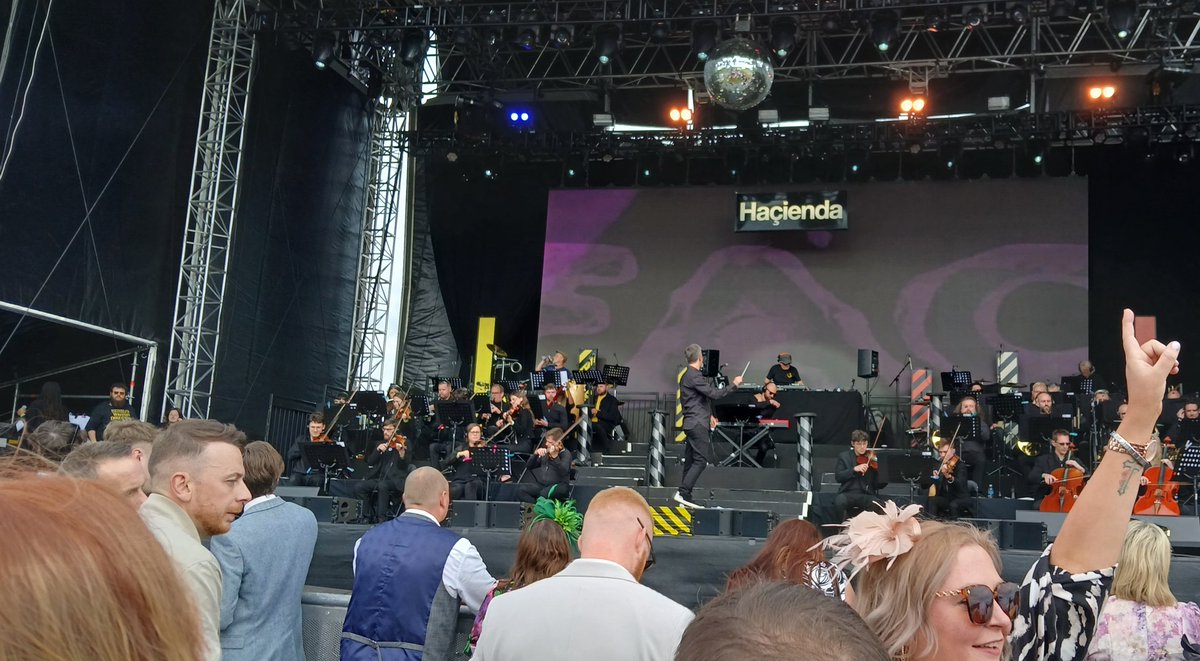 That_Bill's tweet photo. Loved @MancCamerata's #HaciendaClassical gig at Newcastle racecourse today  - Including bass legend @peterhook leading a killer version  of #BlueMonday https://t.co/recOb7uFFb