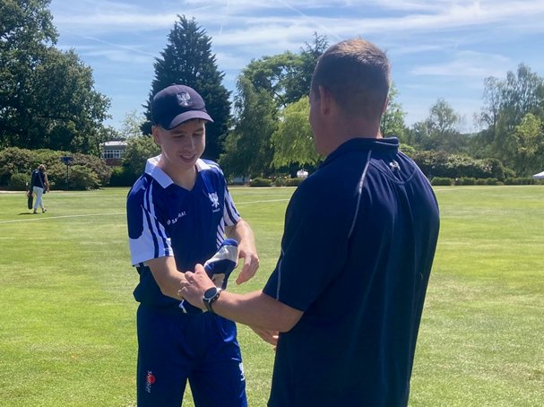 Congratulations to Harry L'Estrange on making his first team debut. Here he is being presented his 1st XI Cap by Mr Hind, Sports Teacher and Old Bedfordian.