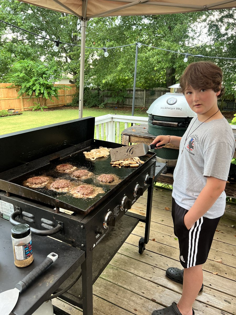 HaroldStockburg's tweet photo. Grandson loves to cook, so I let him cook smashburgers this evening on the Blackstone Griddle, and that’s his creation! #trainthemright #blackstonegriddle #stockburgerbbq #smashburgers https://t.co/hOqRM0AQ5h