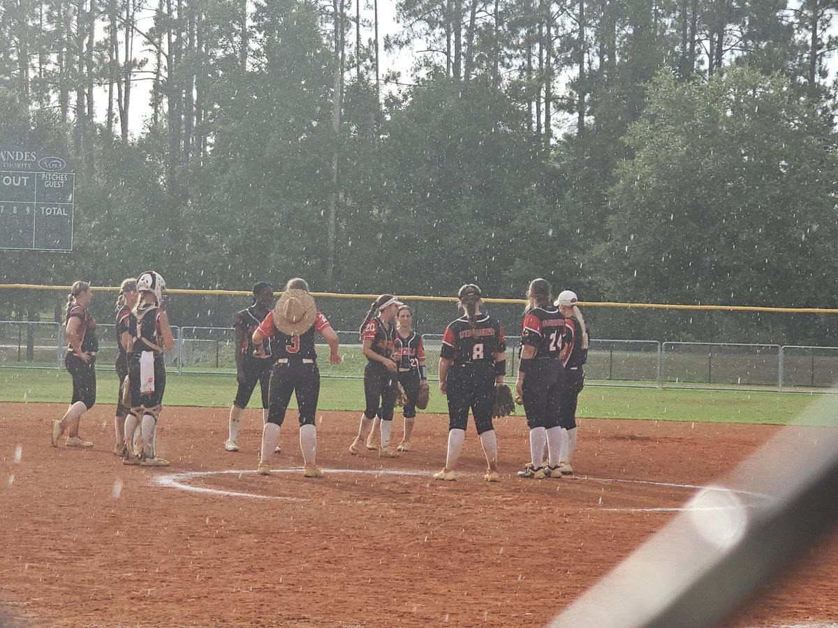 At the ball field at 6;45 this morning. Left the ball field at about 9:45 tonight. I'm tired, but I love every minute of it. Thanks, dad, for the pics. A little rain ain't never hurt nobody.  Jax Storm Showcase Valdosta Ga.
