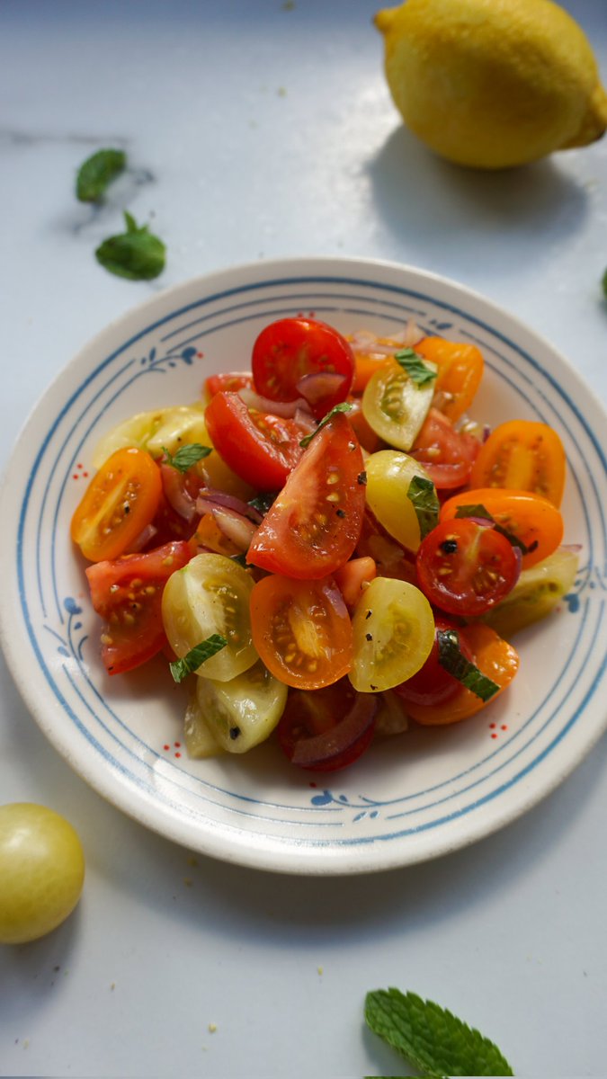 A great, simple, way to enjoy fresh, seasonal tomatoes 🍅 😋

Chop down tomatoes, slice red onion and place in a bowl. Add mint leaves, lemon zest, salt, pepper, extra virgin olive oil. Give everything a gentle mix, plate up, and enjoy.