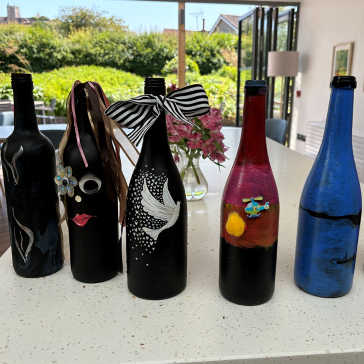Our patients, supported by our Day Services team, created stunning wine bottle ornaments. 

When our patients participate in a group activity, conversation flows, helping to create a sense of purpose for them while they're surrounded by others in similar positions.