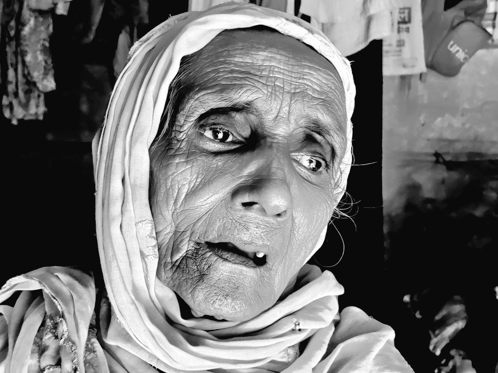 In Alikhali Rohingya Refugee camp, 79-year-old Shaini, a deaf and blind Rohingya woman, relies on her daughter's meager earnings from begging to survive. Their struggle embodies the urgent need for support and compassion for the most vulnerable. 

📸 <a href="/mdhossain5101/">Hossain photographer</a>