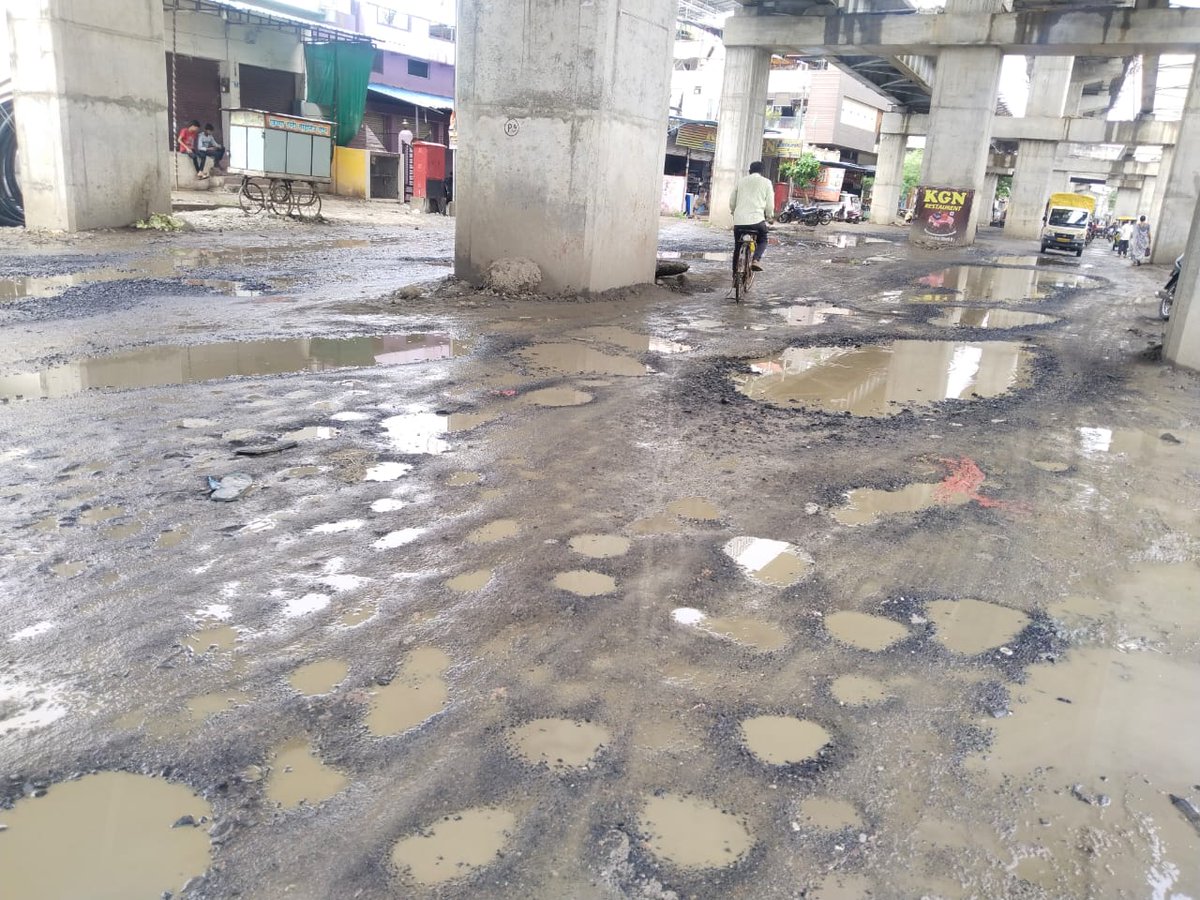 anjaya1905's tweet photo. On one hand, Netas &amp; @ngpnmc are concretizing recently tarred roads in South-west Nagpur &amp; on other side condition of many roads of East &amp; North &amp; Nagpur is very bad. Only potholes can be seen on Rajiv Gandhi Nagar Railway Gate Road. (Pictures by Sheikh Shahnawaz) @nitin_gadkari https://t.co/9HBYNOBwxf