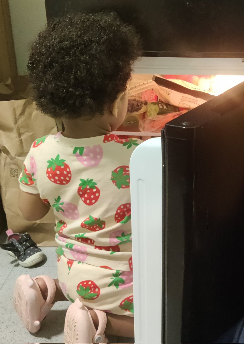 Mom2Elina's tweet photo. Why is she always in the fridge? #hungry #toddler #minifridge #like https://t.co/ZNUP6Q3OPN