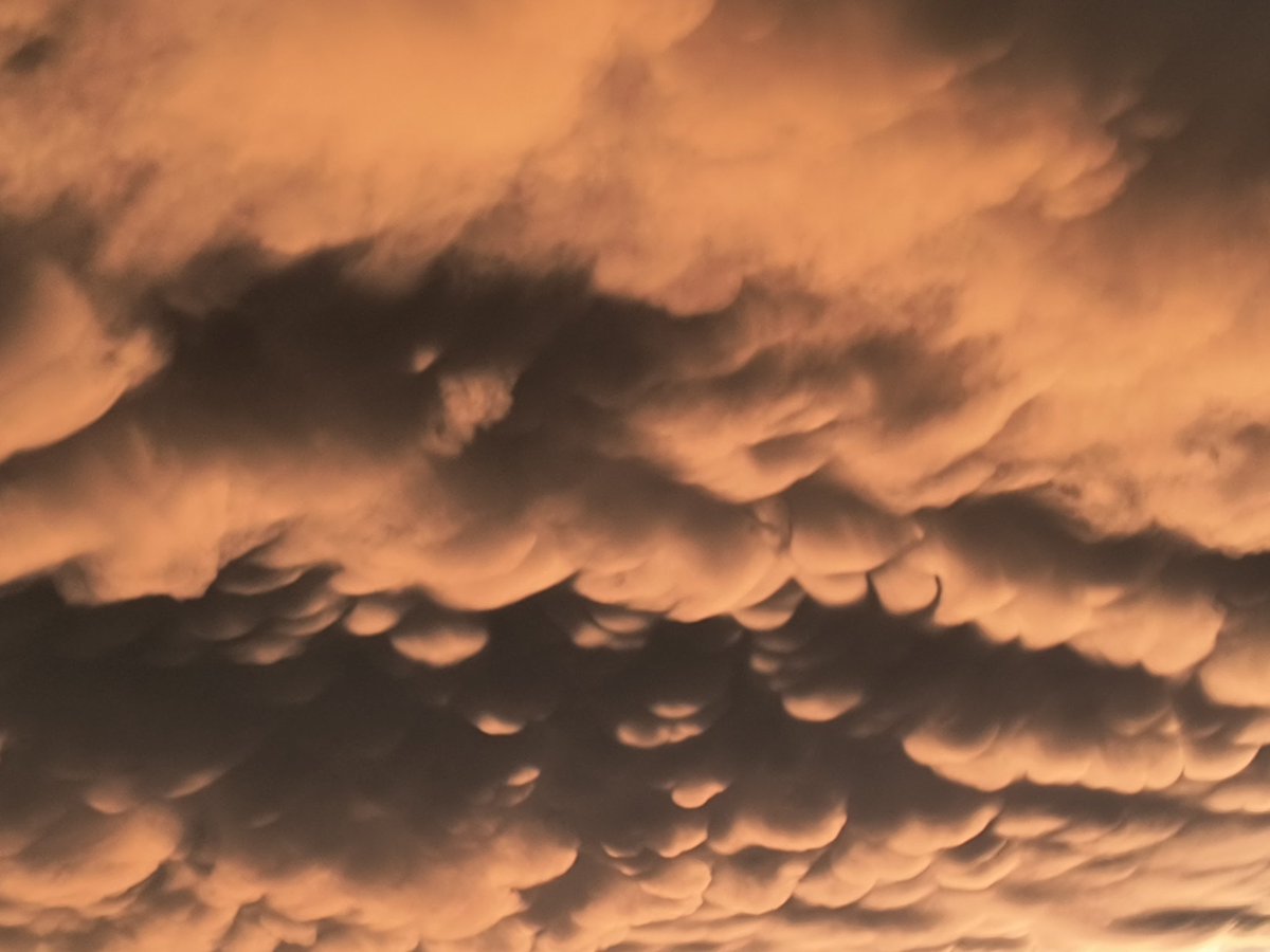 Mammatus clouds from the departing thunderstorm.