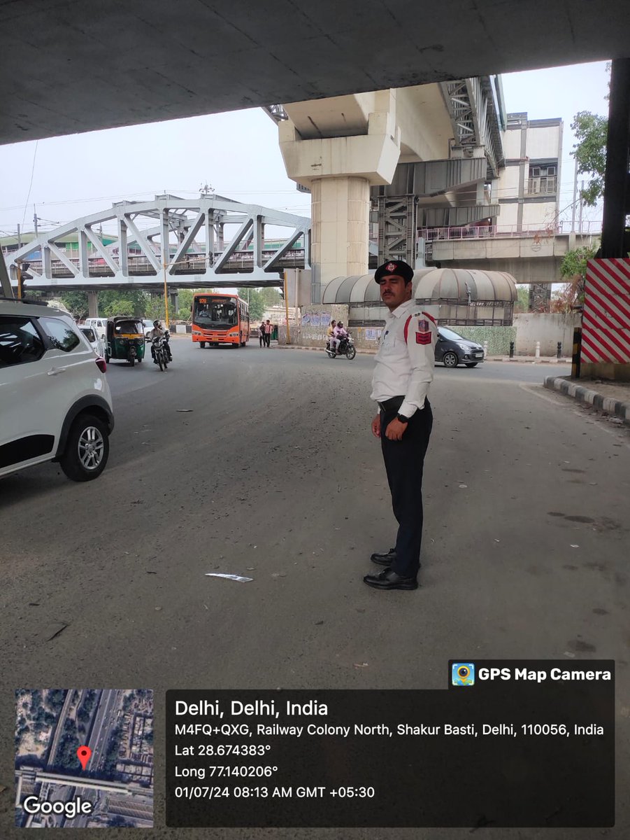 Traffic regulation by staff of Western Range in morning