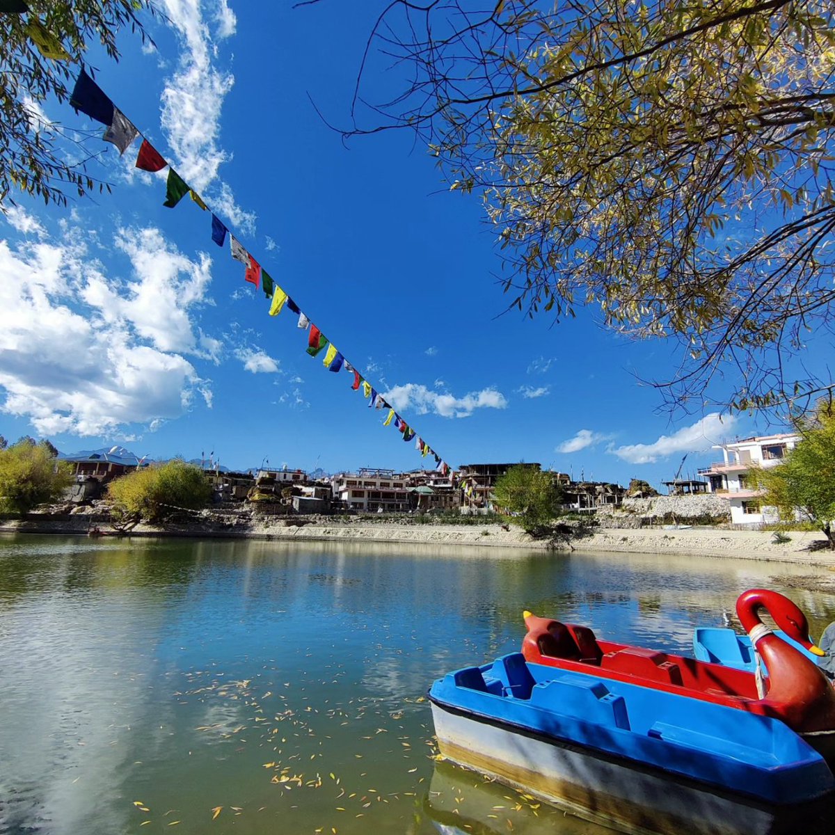 WingsHimalayan's tweet photo. Beyond the monastery, you go through the village streets and reach the lake. We reach.. A calm and beautiful lake is surrounded by trees on all sides.. You can also go boating in it… You can also see the reflection of the mountain in front of you in this lake… https://t.co/LRLFOCH6or