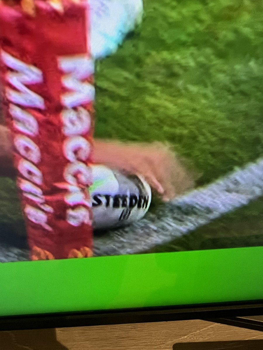 TyBJones86's tweet photo. @onyohead38 @LeagueScenePod First shot hand is covering the word steeden short of the line.. next shot you can see the word  steeden. Which mean he rollled the ball over the line.. and clearly it ain’t in his hand https://t.co/hfy8c6DyGs