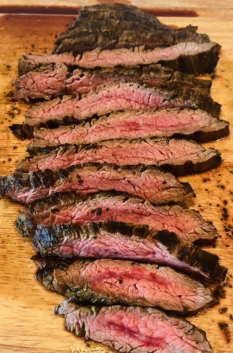 Grilled flank steak.  Tender and delicious.  Who wants a slice?