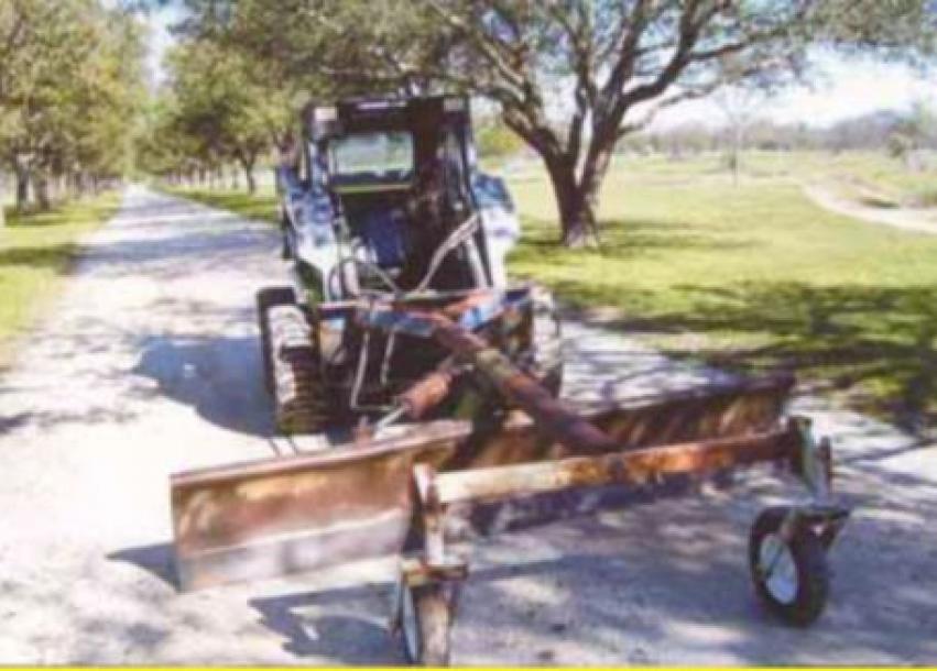 FarmShow's tweet photo. Here’s a photo of a skid loader-mounted road grader that I built out of scrap materials. I started with an old Deere 3-pt. mounted, 8-ft. wide grader blade, which I turned around to face backward. #skidloader #roadgrader #madeitmyself #scrapmaterials https://t.co/GapTnAHAHB https://t.co/F5Lmnpe7Ts