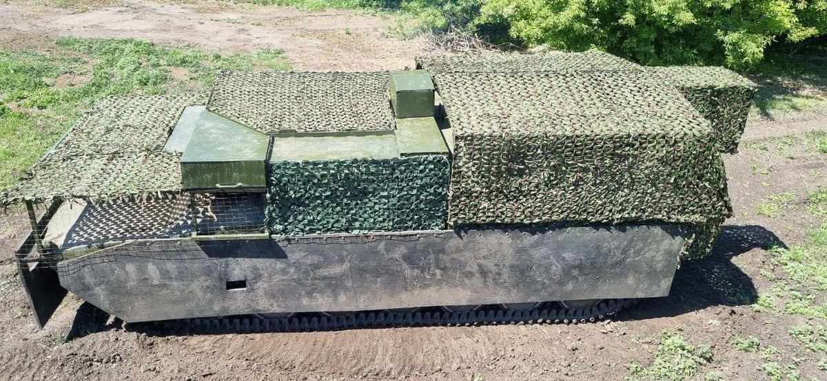 historicfirearm's tweet photo. Apparently there's an MT-LB under there somewhere. 

#Ukraine #UkraineRussiaWar #UkraineWar #MTLB https://t.co/wxxEbX5vV2