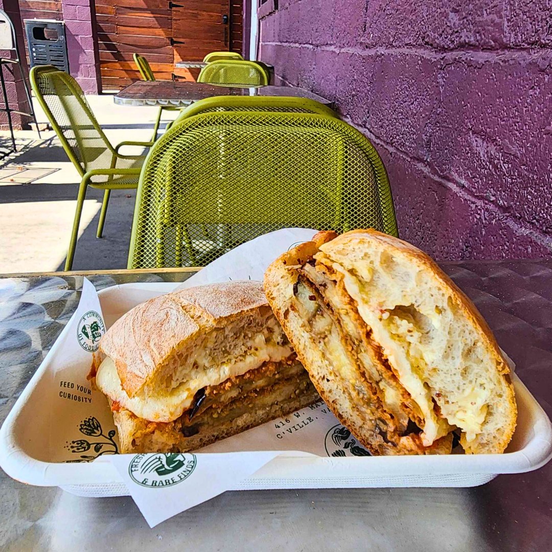 WEEKLY SPECIAL: Eggplant Parmesan - Fried Eggplant, Marinara, Mozzarella &amp; Parmesan with Mayo/Mustard on Ciabatta, served hot

Available: July 1st - 6th #weeklyspecial #lunchdate #eggplant #eggplantparmesan #cvillefoodie #cvilleeats #vegetarian #vegetriansandwich