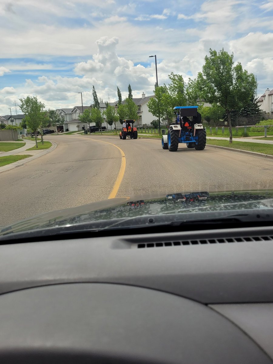DGribby's tweet photo. How do these people get away with this? There are no plates, not registered, no signal or brake lights, sitting on a fender, holding up traffic in rush hour. #yeg @edmontonpolice @yegtraffic #17st #34ave https://t.co/wAOpT7lclj