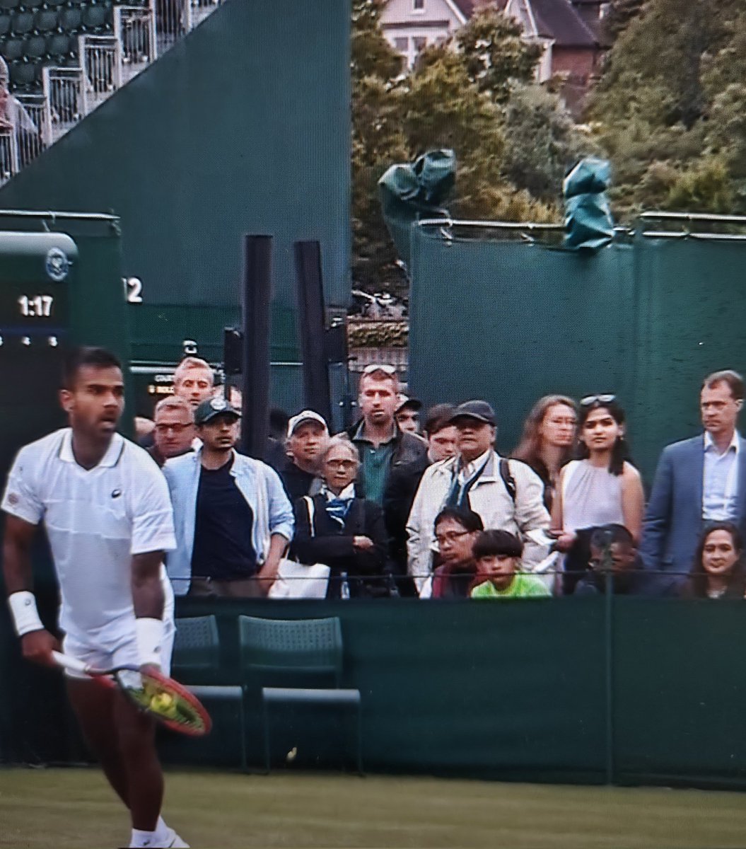 R1979Harry's tweet photo. Indian tennis legend Ramesh Krishnan is in the stands watching the first round match between Sumit #Nagal and Miomir Kecmanovic at #Wimbledon2024 https://t.co/T1hgynqNma