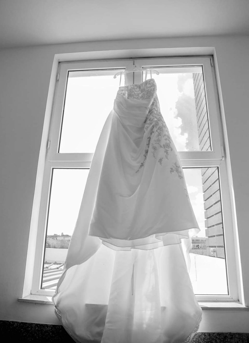 Anybody know somebody that might be interested in purchasing my wedding dress? I had it cleaned and preserved after the wedding, and it's still in the preservation box. I think it fits a size 22/24. No alternations done.