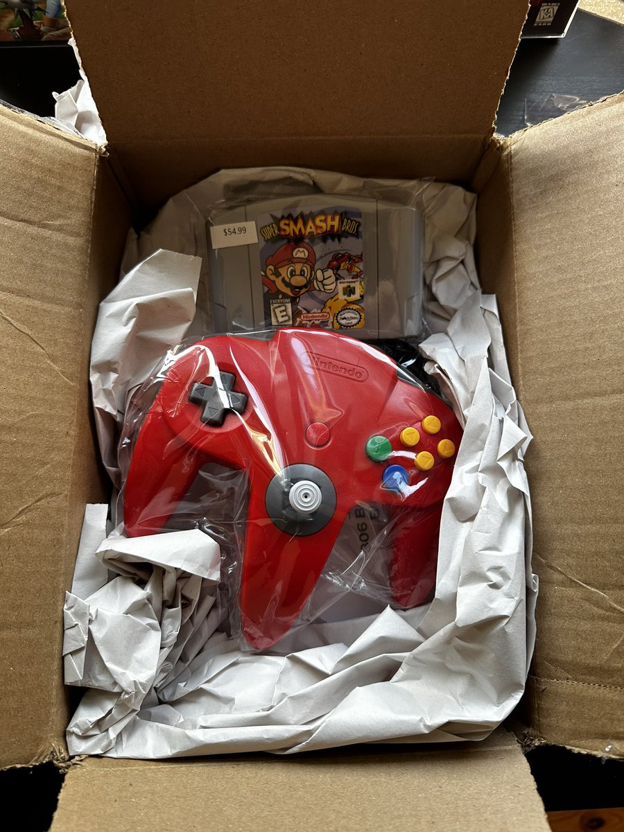 SchmalsNS's tweet image. S/O to @PeachyXDF and @BoomBoomGames85 for full filling my N64 request. Got Super Smash Bros and OEM Red controller