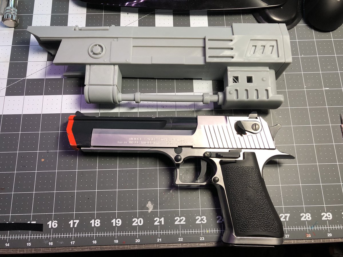 GeekToyLove's tweet photo. #printerbounty, finally getting g around to doing a T-60 pistol from #Fallout. I picked up an Airsoft base model second hand off eBay and printed the barrel extension last night. 

Will need to do some fitting still, hoping to retain most of the functionality and then paint https://t.co/WZmFxK0SMy