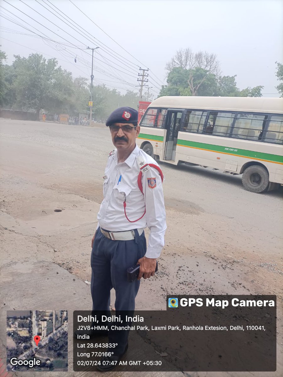 Traffic regulation by staff of Western Range in morning