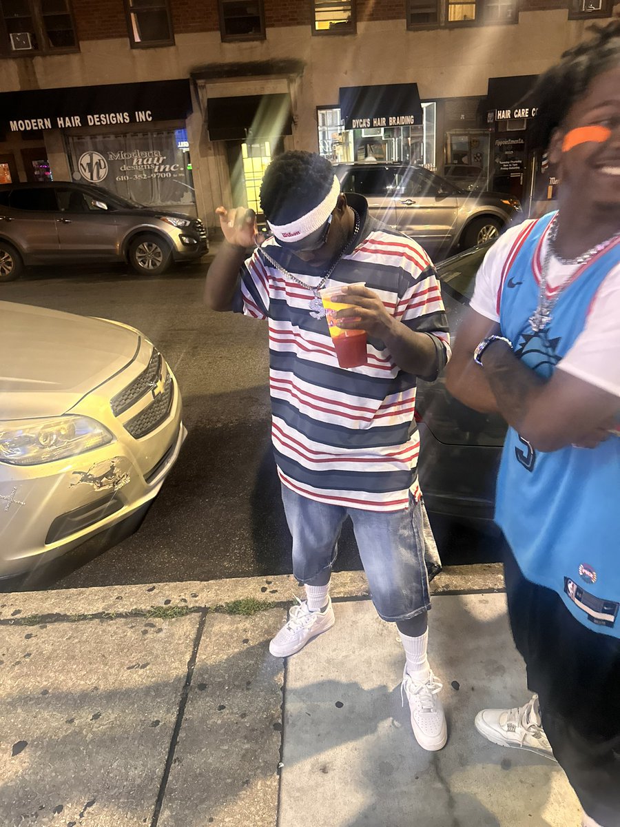 Dressed like ya dads in 2002 giving yall moms a hard time