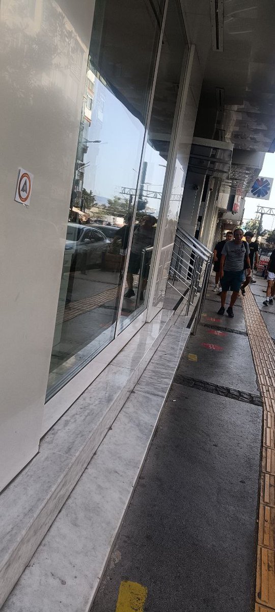 cembakan17's tweet image. #humanode #stickerninja 
@humanode_io 

was pasted on a bank on a busy street.