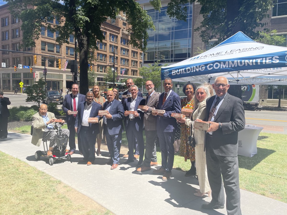 NYSDOS's tweet photo. The Downtown Revitalization Initiative is breathing new life into abandoned, historic buildings! #TeamDOS Diversity, Equity &amp; Inclusion Officer Nicole-Jean Christian attended the renaming ceremony of Harper’s Corner (after Martha Matilda Harper)— a mixed-use project in Rochester! https://t.co/Rz4HP6OE0C