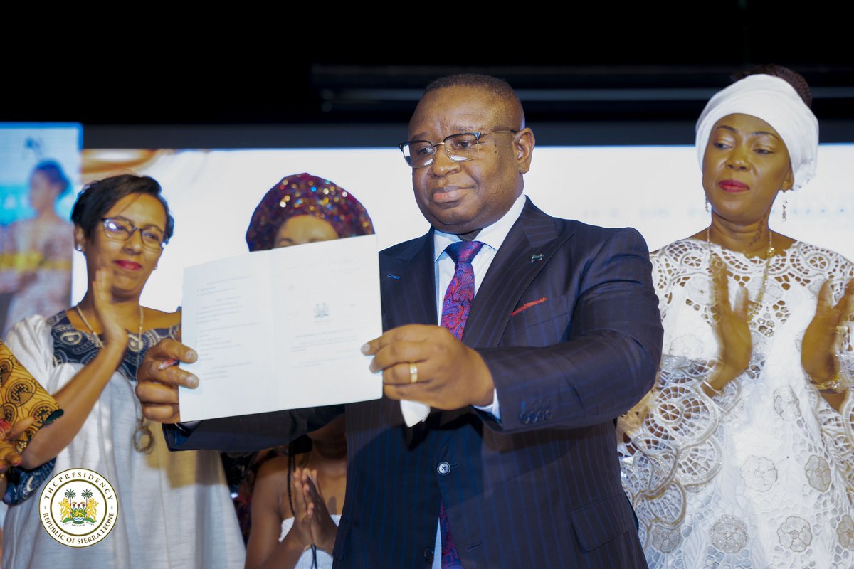 Presidency_SL's tweet photo. At the #WeAreEqual campaign launch today at the Freetown Conference Centre, @PresidentBio signed the Prohibiting Child Marriage Bill into law.

Fatima @FirstLadyBio has always championed women's and girls' rights issues with a very special passion. Together, we want to build an empowered Sierra Leone where women are given an even platform to reach their full potential. 

@PresidentBio have always believed that the future of Sierra Leone is female. This and future generations of girls must thrive in  Sierra Leone in which they're protected, equal,  and empowered.

He thanked the First Ladies who are in Sierra Leone to support the #WeAreEqual campaign. Enjoy our warm Sierra Leonean hospitality.