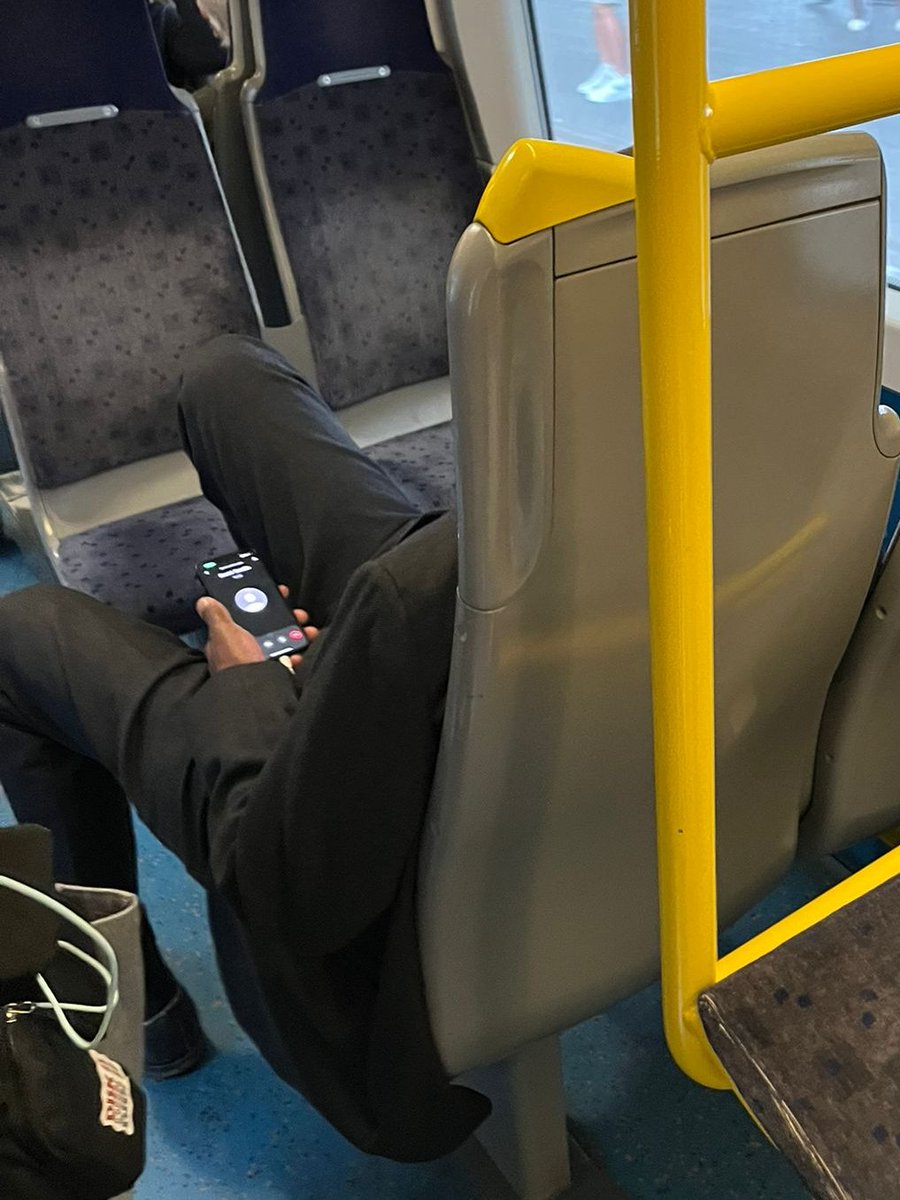 jamborini's tweet image. Saw Kwasi "mini budget" Kwarteng on my commute today. I recognised his voice instantly from @RestIsPolitics Leading. Not content with smugly trashing the economy, he's now got his feet on the seats of a @Se_Railway train.