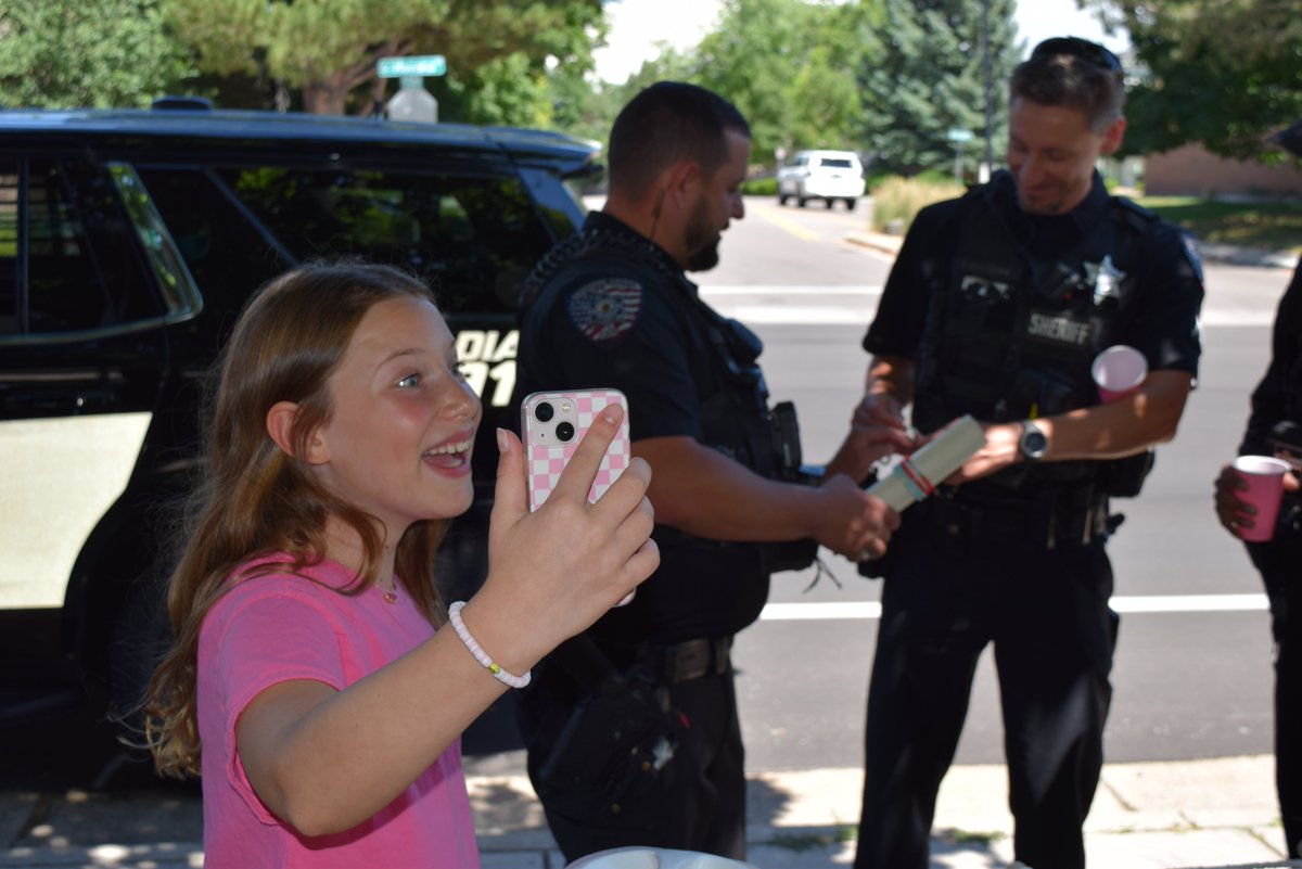 There was a heavy police presence today at the lemonade stand on S. Havana St. and E. Maplewood Ave. Sheriff deputies responded to reports of two girls selling a tasty drink. They stopped by in their patrol cars to assess the situation and Lily, 11, and Mila, 10, couldn't believe