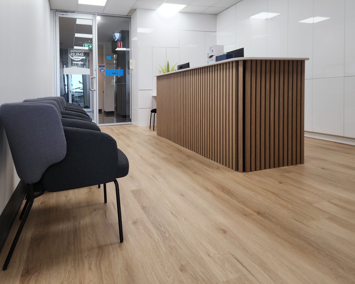 QTCBuild's tweet photo. Welcome to Creative Smiles in Armadale! We recently completed an amazing fitout of their reception area, featuring new flooring, joinery, and painting throughout. 

☎️: 1300 728 723 
🌐: https://t.co/3kGr8QptHB

Quality Assured, Time Sensitive, Cost Effective https://t.co/SUNUmAn5EW