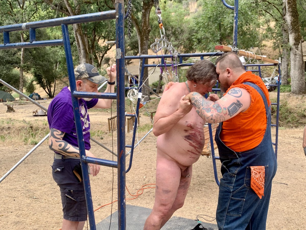 castrokink's tweet photo. Yossie suspends our party chairman Eric by 8-gauge hooks as @GeoffMillard holds space at @the15sf summer camp. #15bootcamp2024 https://t.co/IZ4q7A5fQJ