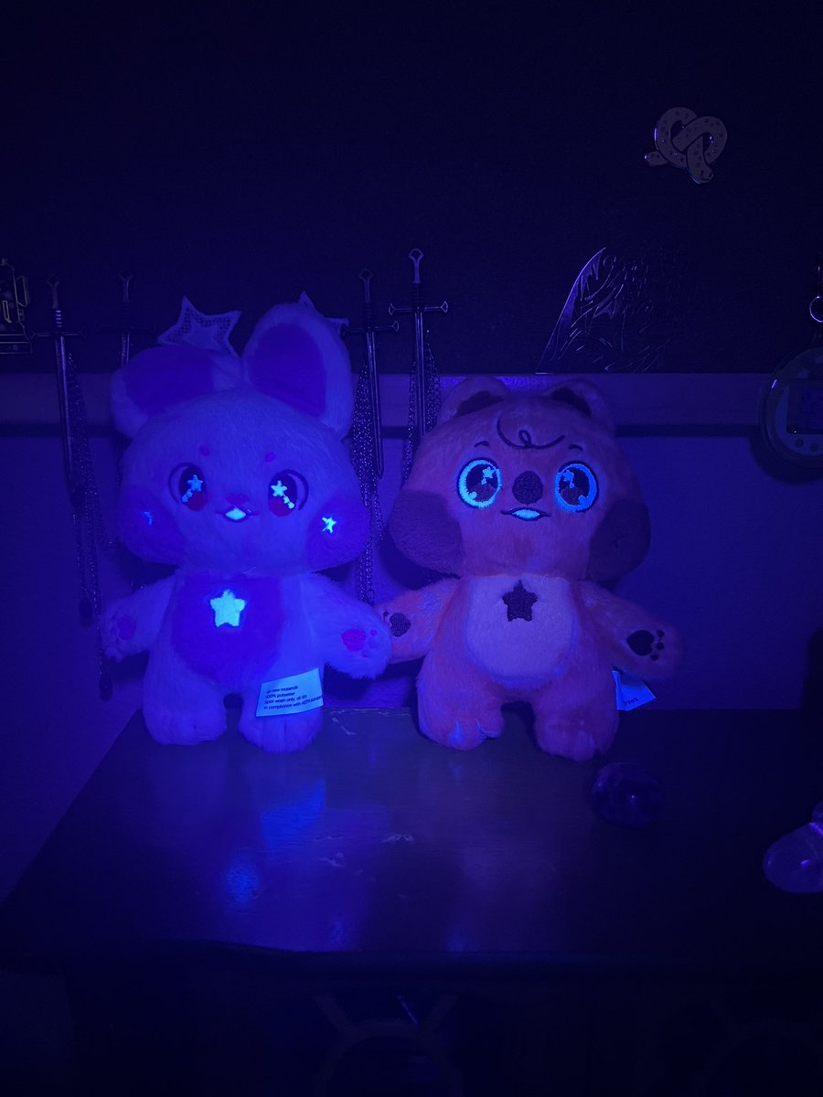 StarlightStomp's tweet photo. Got my package from @kiroujidraws and I must say the boys also join the black light fluorescence  gang! Also I adore these keychains SO much??? https://t.co/byE3aDeSTb