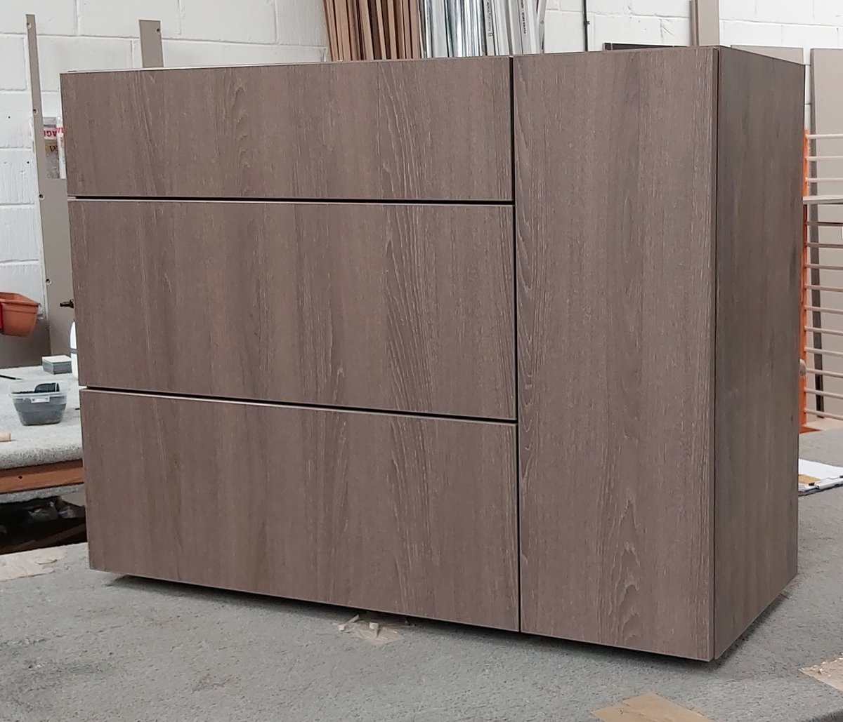 BasicallyTrade's tweet photo. Here's an interestingly designed cabinet which was part of a Bathroom order we completed this week.  Manufactured in EGGER H1379 Brown Orleans Oak using BLUM Antaro drawers with book matched fronts. #bespokebathroom #bespokebathrooms #vanity https://t.co/m0z3TIF4vi