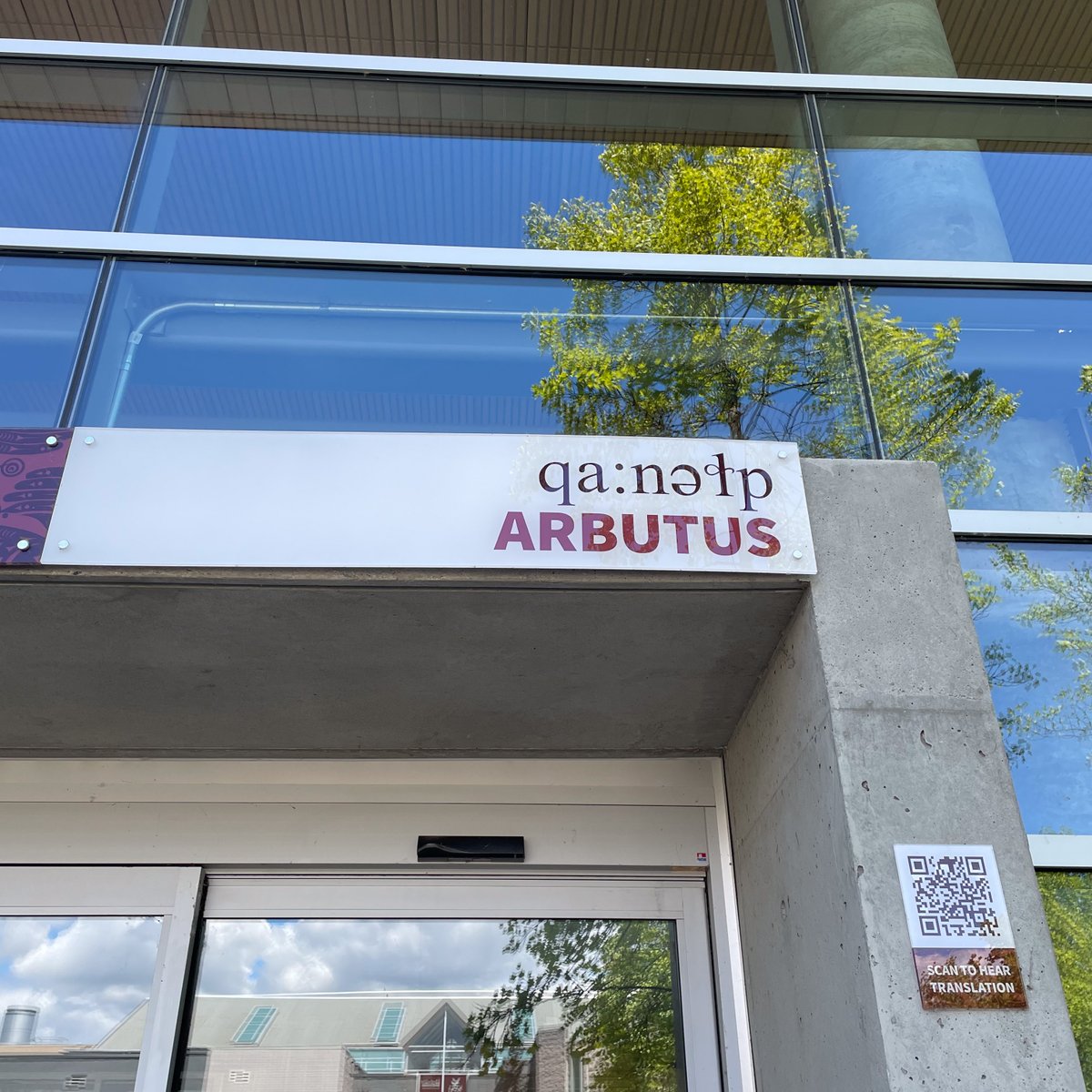 Around our Surrey campus you can find plaques with words in both English and hən̓q̓əmin̓əm̓, the language of the Coast Salish peoples.  Visit bit.ly/3L0yS0V to listen to the pronunciation of these words or use the QR codes next to the signs on campus.