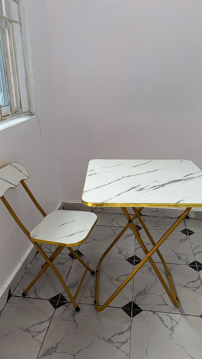 AikhomuVictoria's tweet photo. Adulthood is funny 😂 Got myself a table and chair and I have smiling at it all day, might even sleep on it ☺️ https://t.co/S1D5Ghbd98