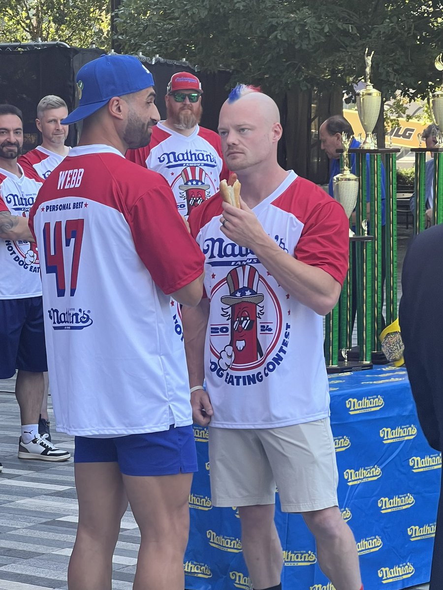 derek11dodd's tweet photo. @thedumbzone - was randomly walking through NY and saw the Nathan’s sign. PreDog press conference for tomorrow.  Had to share. https://t.co/Qq7x7roXh3