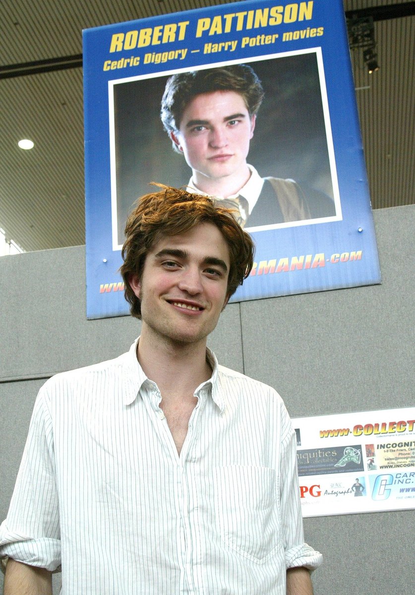Robert Pattinson in front of his character board in Harry Potter and the Goblet of Fire (2006)