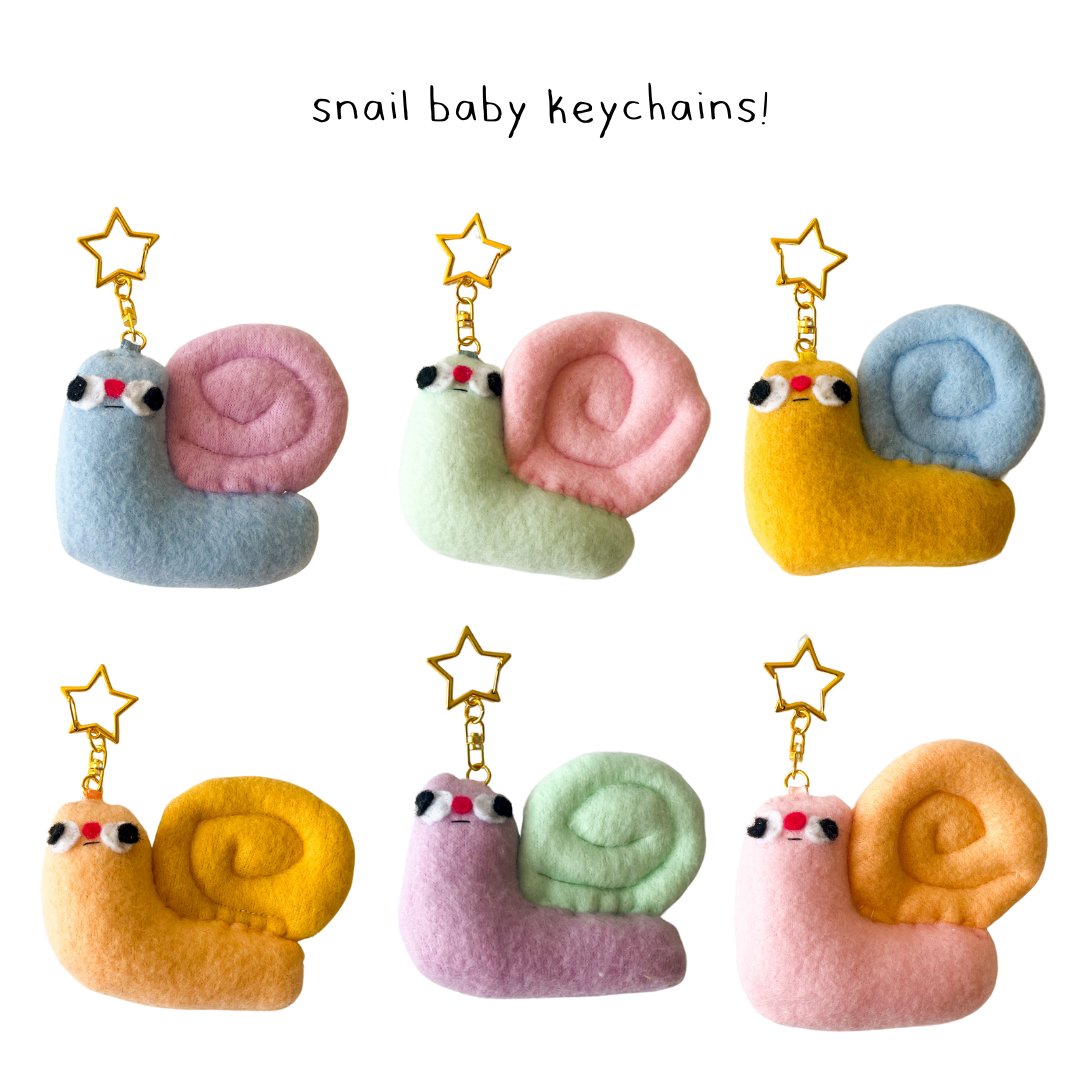 clunkypicnic's tweet photo. snail keychains so we can all have a snail girl summer. https://t.co/6sn169hQ6S