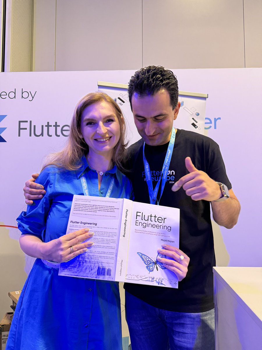 AnnaLeushchenko's tweet photo. I finally have the #FlutterEngineering book signed by our one and only "someone from the community" (aka @mhadaily) 😅 Very proud to have my name on the cover! 💙 https://t.co/KitJPK9Tcb