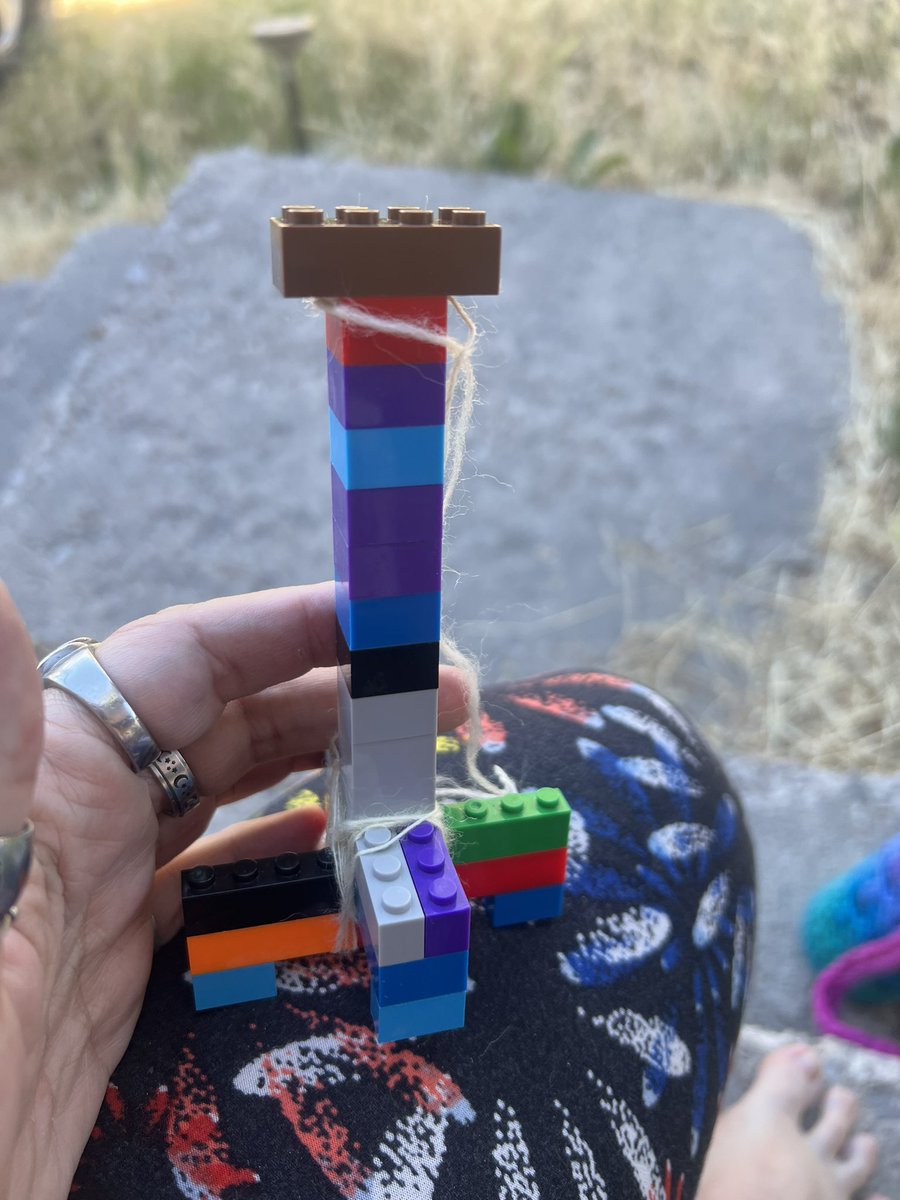 Punxmama's tweet image. My grandson made me a drop spindle out of @lego for a#tourdefleece2024 challenge #handmade #handspinning #dropspindle #handspun #lovemygrandson