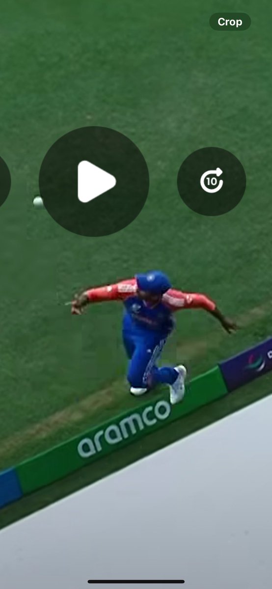 earnab's tweet photo. A lot has been talked about SKY’s catch and controversies around it saying he’s foot touched the boundary padding and it wasn’t a clean catch. 
I found this angle great to see when he held the catch and when he flicked it in the air, he was still inside. https://t.co/CRNXFxXRkq