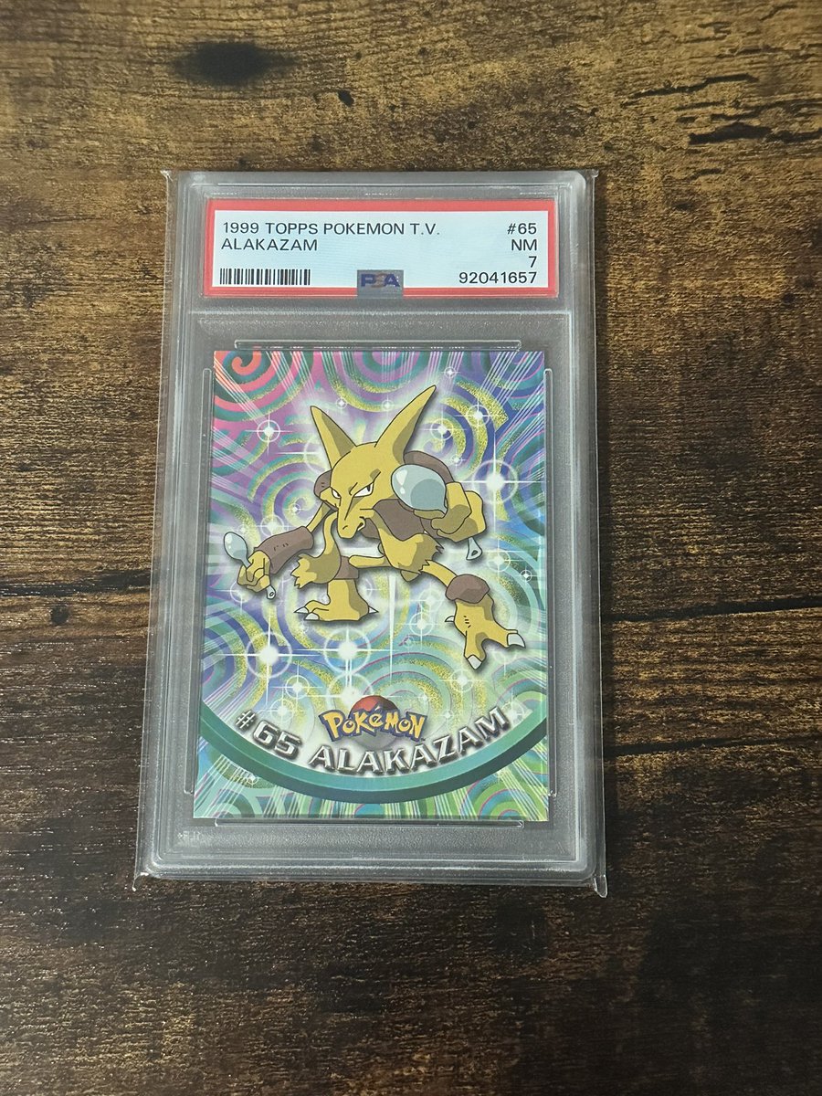 billohazard's tweet photo. 🚨 GIVEAWAY TIME!!! 🚨 

Up for grabs is this Topps Series 1 Alakazam PSA 7 slab!! 

To enter simply 

Like 
RT
Follow me
subscribe to my YouTube! (Link in bio) 

If you’re feeling nice tag some friends but it’s not required :) 

Winner will be drawn Friday July 12th! 

PS if you’re feeling extra nice retweet my pinned tweet, looking to get more eyes on it to hold PSA accountable. Not required at all for the giveaway though! 

#Pokemon #PokemonTCG #Free #Giveaway