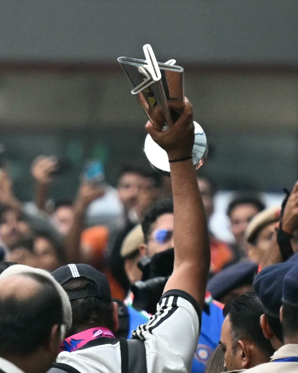 ICC's tweet image. Back on home soil with the #T20WorldCup trophy 🏆