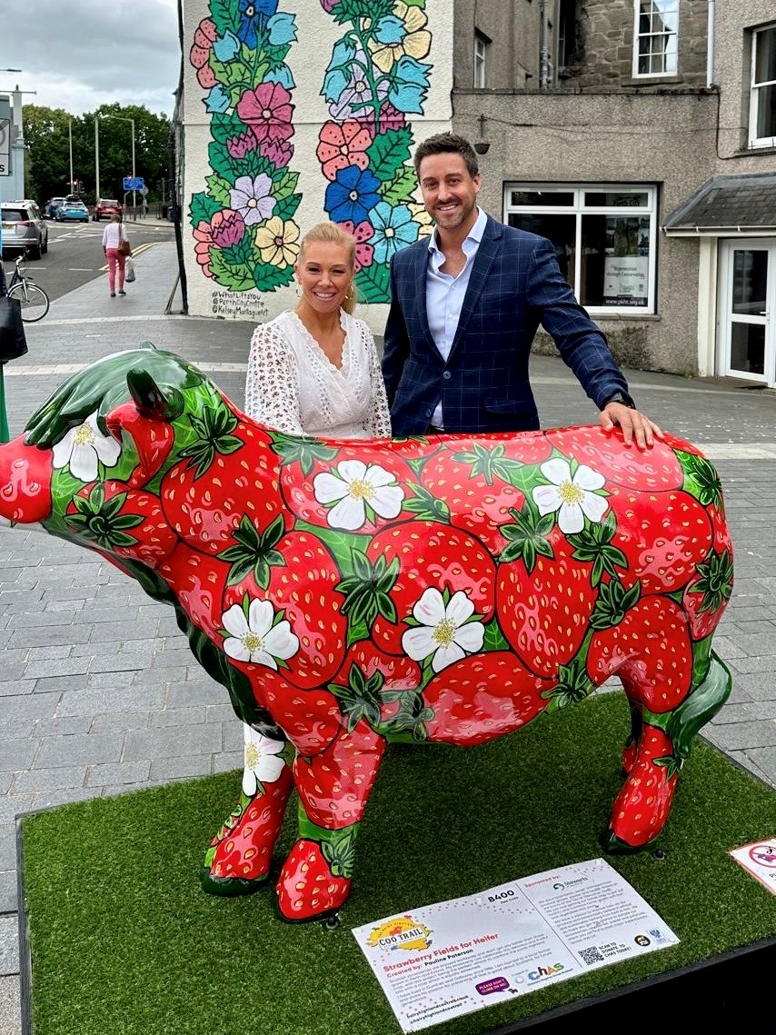 Tofthillfarm's tweet photo. Say hello to “Strawberry Fields For Heifer” (Hettie), our sponsored https://t.co/ZrRD6DHSGc.  Hettie will help @supportCHAS with their amazing work and is located outside Perth Concert Hall.  Painted by the talented Paulene Paterson, tag us in a selfie to enter a prize draw. https://t.co/89plJgwl4d