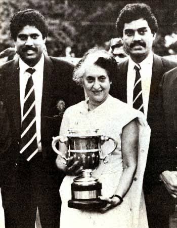 Awara013's tweet photo. @RoshanKrRaii Sonia Gandhi sidelined Manmohan Singh ji to have a PR with winning Indian team 
Indira holding trophy as if she was part of India team

But Modi should not meet winning Teams 

Hate against Modi just because he is Pro Hindu https://t.co/J9zHCeVtk5