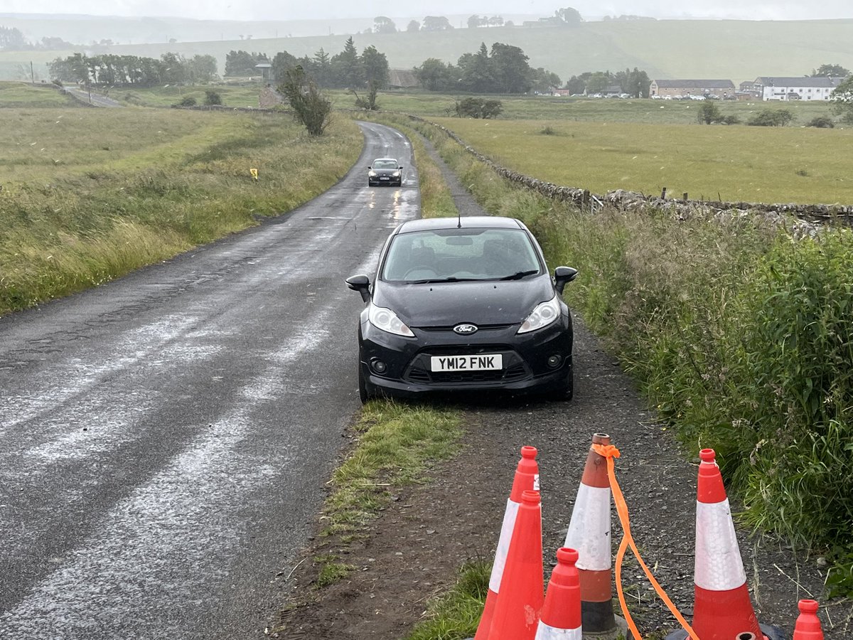 DougF1964's tweet photo. So with 25 kids behind me I come across this car parked on the path. Thankfully at the time it was chucking down with rain so the driver will have got soaked. That’s karma 😀 https://t.co/DAvE5dpV1v