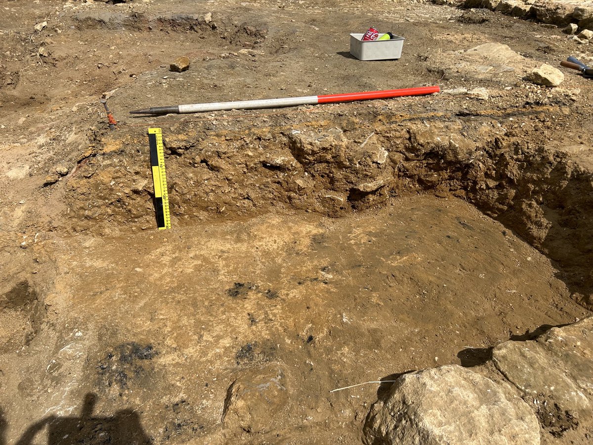 Two mortar floors both with burning above. Separated by 30cm and probably a few hundred years they seem to confirm a suspected reuse of the central range of our building complex at Guiting Power